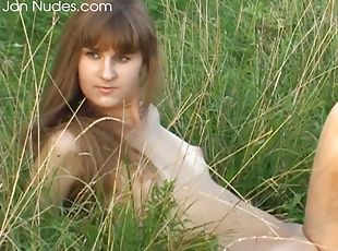 Adorable Violetta goes totally naked in the green countryside