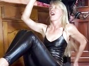 Sexy leather ball busting milf under milking table