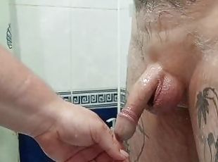 bitch jerks off my dick in the bathroom until I cum
