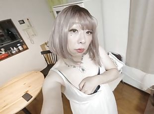 Japanese crossdresser cums while working with his hands in a summer dress