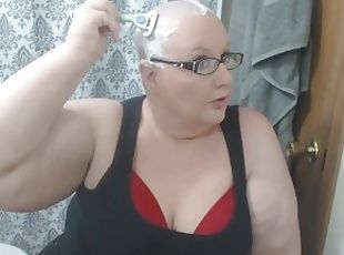 Sweet sub Cherry Savage shaving her head with a razor