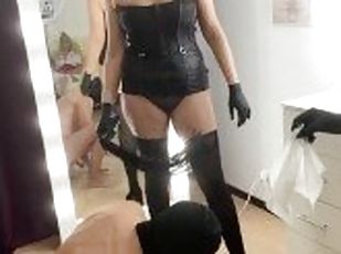 Two Russian mistresses play with the slave's cock