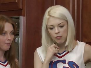 Two lesbian cheerleaders acting up on the bed