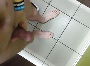 Fully naked and masturbating in public toilet